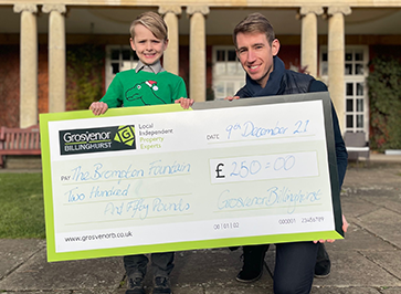 Grosvenor’s Christmas card competition winner, Joshua Handel, 6, receives £250 to donate to The Brompton Fountain